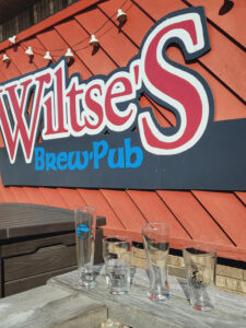 Wiltse's Pub sign and glasses