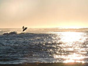 Jet ski on water at sunset