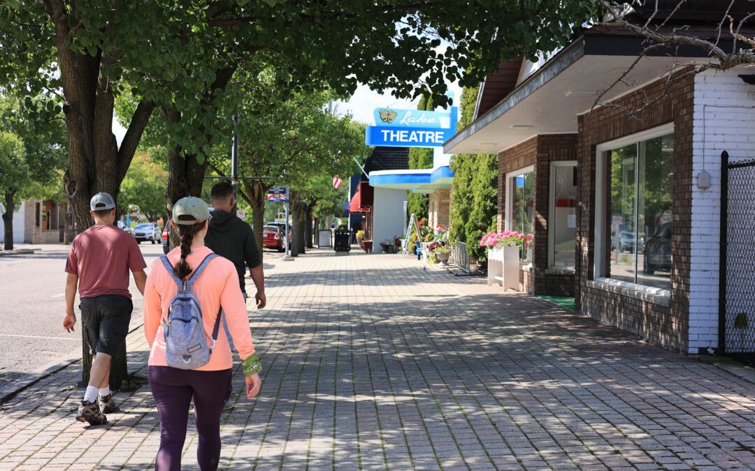 People walking on the sidewalk downtown