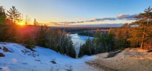 Sunset over AuSable River in winter