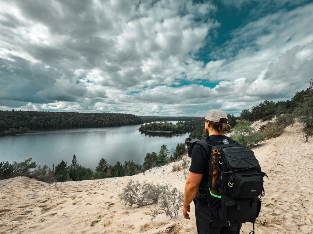 Hiker overlooking the AuSable River